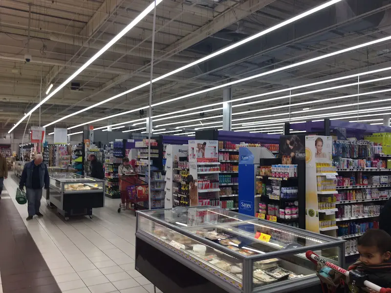 Parkade IP66 LED tri-proof light for retail store applications.