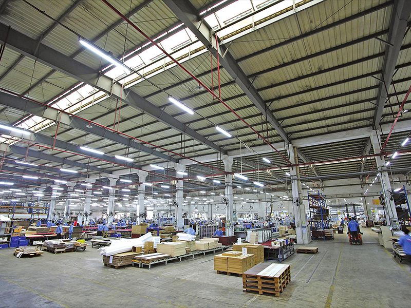 Well-lit workshop using ShineLong LED tri-proof fixtures for safety